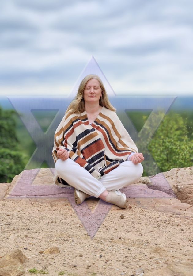 Johanna sitting cross-legged on a rock with eyes closed and a geometric overlay, representing stillness, alignment and inner awareness
